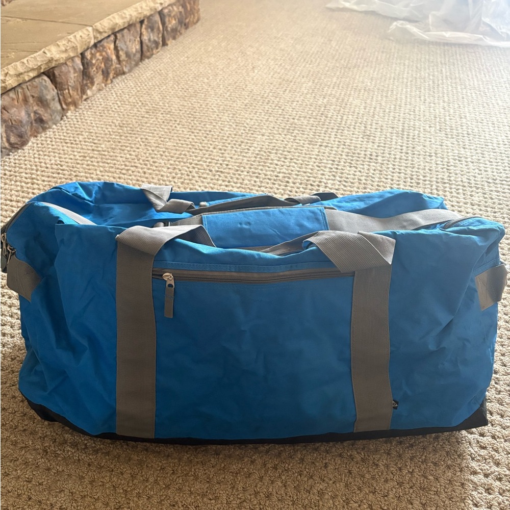 Blue Duffel Bag with Gray Straps